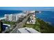 Aerial view of coastline and community at 1501 Gulf Blvd # 104, Clearwater Beach, FL 33767