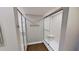 Updated bathroom with walk-in shower and modern fixtures at 1501 Gulf Blvd # 104, Clearwater Beach, FL 33767