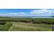 Scenic view of a tranquil bay, mangrove trees, and distant cityscape at 1501 Gulf Blvd # 104, Clearwater Beach, FL 33767