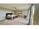 Spacious bedroom with large mirror and access to balcony at 1501 Gulf Blvd # 104, Clearwater Beach, FL 33767