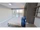 Bedroom with a wall bed and stunning water views at 1501 Gulf Blvd # 104, Clearwater Beach, FL 33767