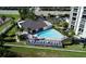 Aerial view of community pool with lounge area at 1501 Gulf Blvd # 104, Clearwater Beach, FL 33767