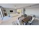 Elegant dining room with a modern dining table and seating at 1501 Gulf Blvd # 104, Clearwater Beach, FL 33767