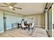 Bright dining area with access to balcony and modern decor at 1501 Gulf Blvd # 104, Clearwater Beach, FL 33767