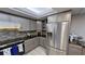 Modern kitchen with stainless steel appliances and granite countertops at 1501 Gulf Blvd # 104, Clearwater Beach, FL 33767