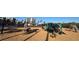 Community playground with play equipment and wood chips at 1501 Gulf Blvd # 104, Clearwater Beach, FL 33767