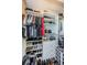 Large walk-in closet with ample shelving and hanging space at 1621 Eagle Creek Dr, Clearwater, FL 33764