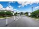Community gated entrance with landscaping at 1621 Eagle Creek Dr, Clearwater, FL 33764