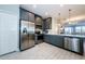Modern kitchen with stainless steel appliances and gray cabinets at 1621 Eagle Creek Dr, Clearwater, FL 33764