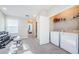 Convenient laundry room with washer, dryer, and storage at 1621 Eagle Creek Dr, Clearwater, FL 33764