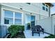 Private patio with two chairs and fenced yard at 1621 Eagle Creek Dr, Clearwater, FL 33764