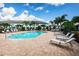 Community pool with plenty of lounge chairs at 1621 Eagle Creek Dr, Clearwater, FL 33764