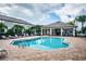 Relaxing community pool with surrounding patio and seating at 1621 Eagle Creek Dr, Clearwater, FL 33764