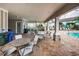 Pool area with covered seating and tables at 1621 Eagle Creek Dr, Clearwater, FL 33764