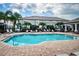 Community swimming pool with lounge chairs at 1621 Eagle Creek Dr, Clearwater, FL 33764