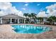 Resort-style pool with seating and a covered patio at 1621 Eagle Creek Dr, Clearwater, FL 33764