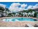 Inviting community pool with surrounding lounge chairs at 1621 Eagle Creek Dr, Clearwater, FL 33764