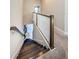 Dark wood staircase leading to upper level at 1621 Eagle Creek Dr, Clearwater, FL 33764