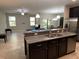 Modern kitchen with granite countertops and stainless steel appliances at 17241 Old Tobacco Rd, Lutz, FL 33558