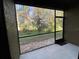 Screened porch overlooking a wooded backyard at 17241 Old Tobacco Rd, Lutz, FL 33558