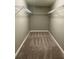 Large walk-in closet with wire shelving and carpeted flooring at 17241 Old Tobacco Rd, Lutz, FL 33558