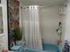 Bathroom features a shower/tub combo and updated fixtures at 2003 Greenbriar Blvd # 11, Clearwater, FL 33763