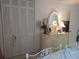 Bedroom with antique dresser and spacious closet at 2003 Greenbriar Blvd # 11, Clearwater, FL 33763