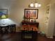 Dining area featuring a wood table and framed artwork at 2003 Greenbriar Blvd # 11, Clearwater, FL 33763