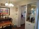 Bright dining area with kitchen access and built-in shelving at 2003 Greenbriar Blvd # 11, Clearwater, FL 33763