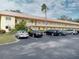 Condo building with ample parking and landscaping at 2003 Greenbriar Blvd # 11, Clearwater, FL 33763