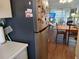 Stainless steel refrigerator in kitchen at 2003 Greenbriar Blvd # 11, Clearwater, FL 33763