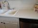 Kitchen features double sink and dishwasher at 2003 Greenbriar Blvd # 11, Clearwater, FL 33763