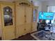 Living room with built-in entertainment center and TV at 2003 Greenbriar Blvd # 11, Clearwater, FL 33763