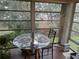 Sunroom with table and chairs, great view at 2003 Greenbriar Blvd # 11, Clearwater, FL 33763