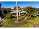 Aerial view of a charming house with a landscaped yard and walkway at 2834 Coffee Pot Ne Blvd, St Petersburg, FL 33704