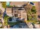 Aerial view of a house with pool, showcasing its layout and surrounding landscape at 2834 Coffee Pot Ne Blvd, St Petersburg, FL 33704