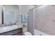 Bathroom with shower/tub combo and granite vanity at 3546 Thistle Bank Ct, Plant City, FL 33565