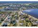 Aerial view of a house and neighborhood, highlighting its location near the water at 402 Pineapple St, Tarpon Springs, FL 34689