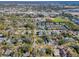 Aerial view showcasing a house's location within a residential neighborhood at 402 Pineapple St, Tarpon Springs, FL 34689