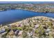 Aerial view of a house and neighborhood by the water at 402 Pineapple St, Tarpon Springs, FL 34689