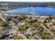 Aerial view showing a house's location in a residential area near water at 402 Pineapple St, Tarpon Springs, FL 34689