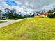 Large grassy lot in a residential area at 4293 Shrimp Ln, North Port, FL 34286