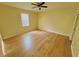 Spacious bedroom with light flooring and ceiling fan at 4293 Shrimp Ln, North Port, FL 34286