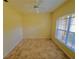 Bedroom with large window and tile flooring at 4293 Shrimp Ln, North Port, FL 34286