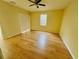 Bright bedroom featuring light walls and laminate flooring at 4293 Shrimp Ln, North Port, FL 34286