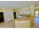 Kitchen with white cabinets and breakfast bar at 4293 Shrimp Ln, North Port, FL 34286
