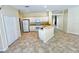 Kitchen with white cabinets and tile flooring at 4293 Shrimp Ln, North Port, FL 34286