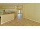 Open living room with tile flooring and neutral colors at 4293 Shrimp Ln, North Port, FL 34286