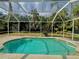 Inviting screened-in pool area at 4293 Shrimp Ln, North Port, FL 34286