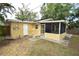 Backyard with screened porch and patio at 619 Glenoak N St, St Petersburg, FL 33703
